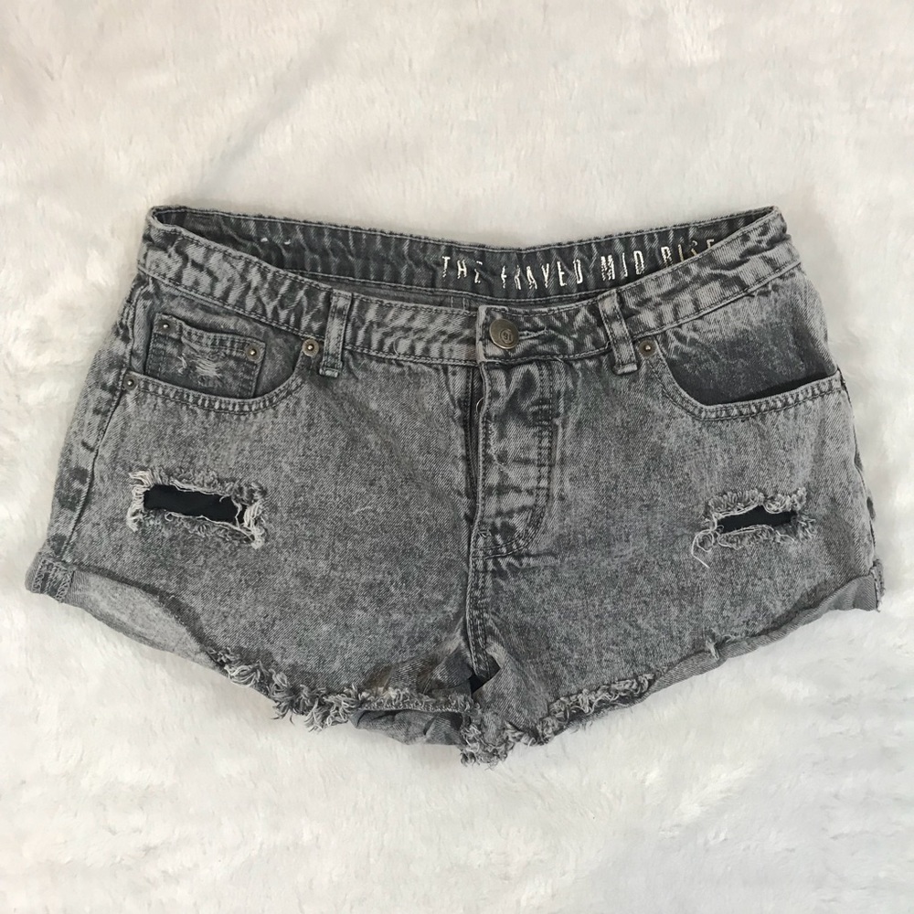 Mid rise stone wash jean shorts